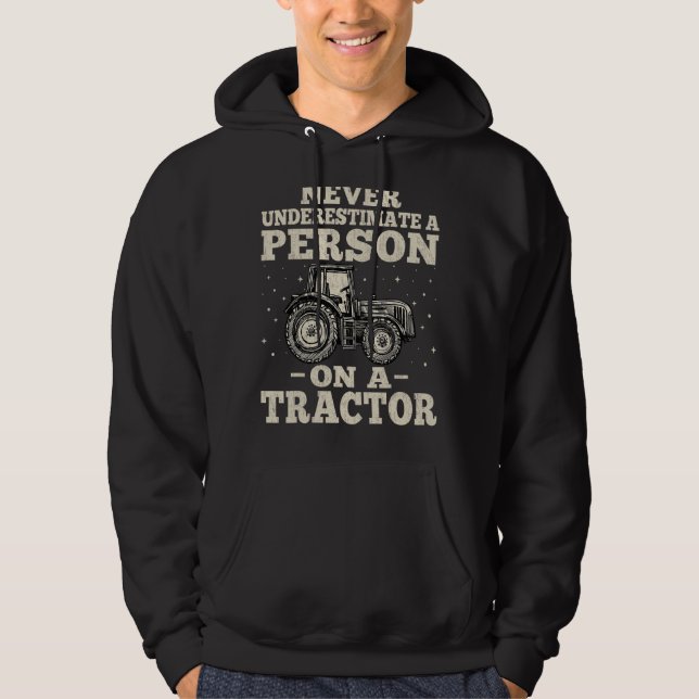 Never Underestimate A Person On A Tractor  Farming Hoodie (Front)