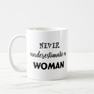 never underestimate a woman coffee mug