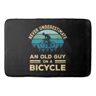 Never Underestimate An Old Guy On A Bicycle Funny Bath Mat