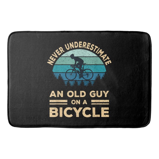 Never Underestimate An Old Guy On A Bicycle Funny  Bath Mat (Front)