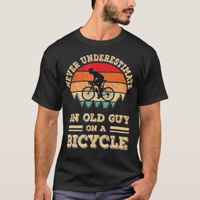Never Underestimate An Old Guy On A Bicycle Funny  T-Shirt (Front)