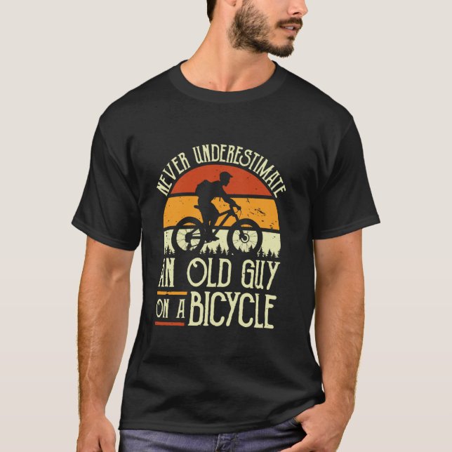 Never Underestimate An Old Guy On A Bicycle Funny  T-Shirt (Front)