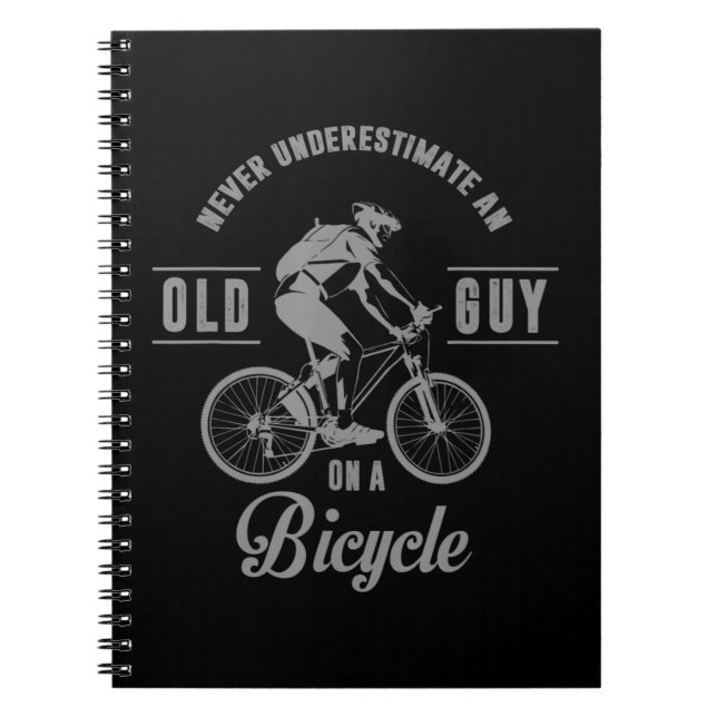 Never Underestimate An Old Guy On A Bicycle Never  Notebook (Front)