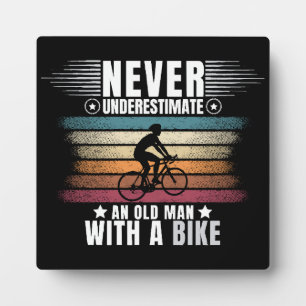 Never Underestimate An Old Man On A Bike Plaque