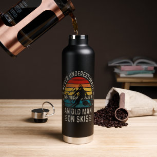 Never Underestimate An Old Man On Skis Retro Sunse Water Bottle