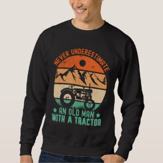 never underestimate an old man with a tractor sweatshirt