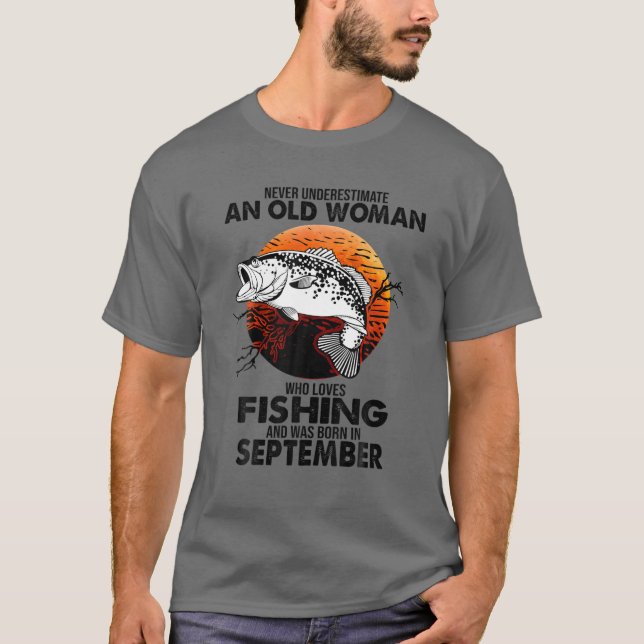 Never Underestimate Old Woman Loves Fishing Born S T-Shirt (Front)