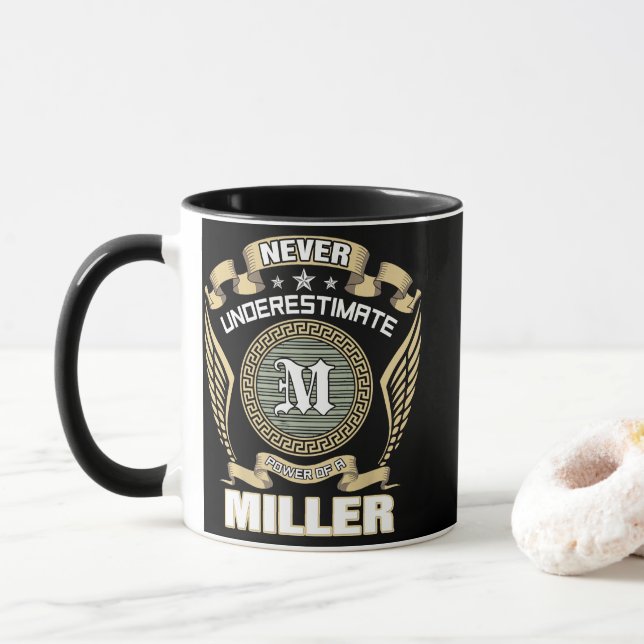 NEVER_UNDERESTIMATE_POWER_OF_A_MILLER MUG (With Donut)