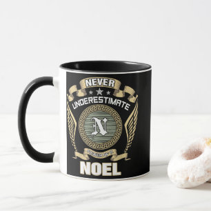NEVER_UNDERESTIMATE_POWER_OF_A_NOEL MUG
