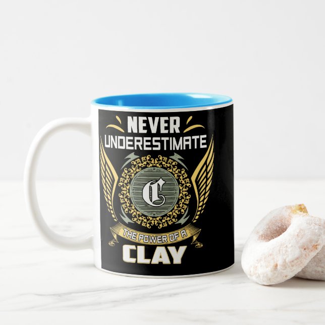Never Underestimate The Power Of A Clay Two-Tone Coffee Mug (With Donut)