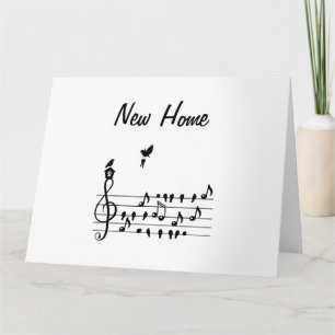 New home, song bird carrying key of new home card