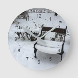 New snow on the armchair round clock