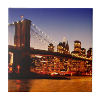 New York cityscape with bridge over river Tile