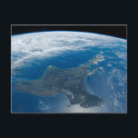 New Zealand's North Island. Postcard<br><div class="desc">January 2, 2022 - View from space of New Zealand''s North Island that separates the Tasman Sea from the South Pacific Ocean. On the other side of Cook Strait, South Island peeks out from beneath the cloud cover. Seven bays surround the North Island and define its distinctive shape. The inland...</div>