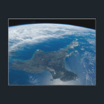 New Zealand's North Island. Postcard<br><div class="desc">January 2, 2022 - View from space of New Zealand''s North Island that separates the Tasman Sea from the South Pacific Ocean. On the other side of Cook Strait, South Island peeks out from beneath the cloud cover. Seven bays surround the North Island and define its distinctive shape. The inland...</div>