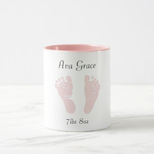 Newborn baby feet coffee cup