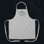 Newlywed Bride Personalised Grey Apron<br><div class="desc">For the bride and groom, this grey apron features "Mrs." in a modern script font along with a last name and established date. This is a perfect bridal shower or wedding gift. These Mrs. and Mr. aprons are available in a variety of colours and can be also customised to match...</div>
