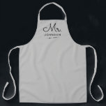 Newlywed Groom Personalised Grey Apron<br><div class="desc">For the bride and groom, this grey apron features "Mr." in a modern script font along with a last name and established date. This is a perfect bridal shower or wedding gift. These Mr. and Mrs. aprons are available in a variety of colours and can be also customised to match...</div>