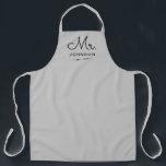 Newlywed Groom Personalised Grey Apron<br><div class="desc">For the bride and groom, this grey apron features "Mr." in a modern script font along with a last name and established date. This is a perfect bridal shower or wedding gift. These Mr. and Mrs. aprons are available in a variety of colours and can be also customised to match...</div>