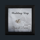 Newlyweds Wedding Day  Gift Box<br><div class="desc">Newlyweds Wedding Day gift box.
Features silver and bronze wedding rings photo as background.
This elegant design can also be personalised with the names of the lucky
couple and the year of marriage.</div>