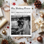 Newspaper First Christmas Engaged Unique Holiday Card<br><div class="desc">Celebrate your engagement in unforgettable style with this charming, newspaper-inspired holiday card, designed especially for newly engaged couples who want to share their big news with a festive twist. Styled as a vintage newspaper cover, this "First Year Engaged" card captures the thrill of your announcement, combining holiday cheer with a...</div>