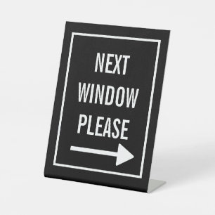 Next window please pedestal sign