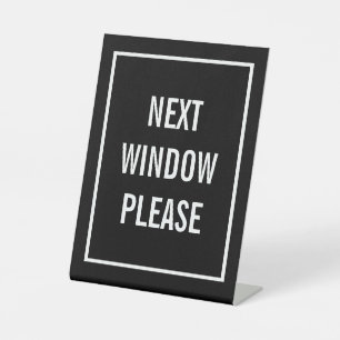 Next window please pedestal sign