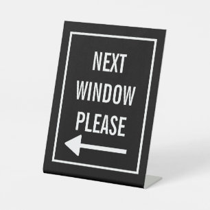 Next window please pedestal sign