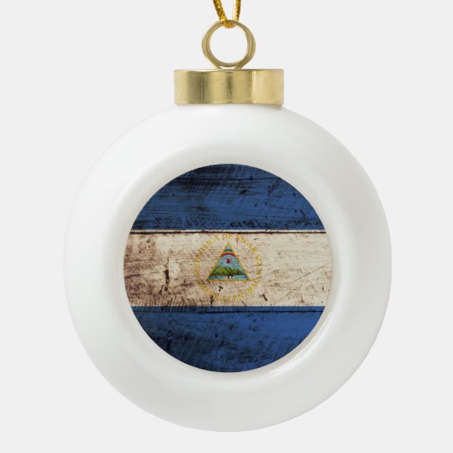 Nicaragua Flag on Old Wood Grain Ceramic Ball Christmas Ornament (Front)