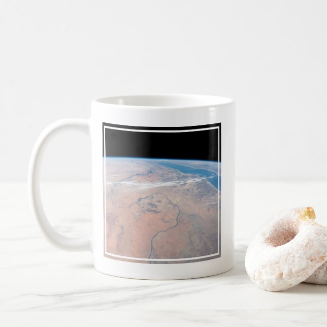 Nile River Winding Northward Next To The Red Sea Coffee Mug (With Donut)