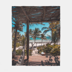Nipa hut under coconut palm trees fleece blanket
