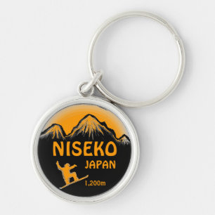 Niseko Japan orange snowboard art keychain