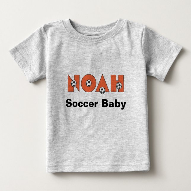 Noah in Soccer Orange Baby T-Shirt (Front)