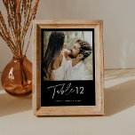 NOIR Minimalist Photo Table Number 5x7<br><div class="desc">The NOIR Collection features a classic black colour and a stunning modern calligraphy script font, creating a look that is both elegant and sophisticated. This collection is perfect for couples who want to create a timeless and classic feel for their special event. The bold black colour scheme creates a striking...</div>