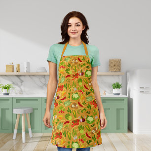 Noodles and colourful vegetables orange apron
