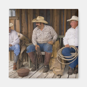 North America, USA. Cowboys relaxing and Magnet