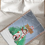 North Pole Snowman Dragon Penguin Christmas Throw Blanket<br><div class="desc">A cute penguin giving a green dragon a Christmas present. A snowman with a mothPole candy cane sing in a backdrop of falling snow</div>