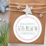North Pole Special Delivery Cute First Christmas Classic Round Sticker<br><div class="desc">Personalised first Christmas stickers for baby from Santa. This cute design features whimsical typography, decorated with a penguin, giraffe, reindeer, bear, christmas birds, holly and string lights. The stickers are lettered stamp style, around the edge with "Special delivery from Santa .. North Pole Reindeer Express" and you can personalise the...</div>