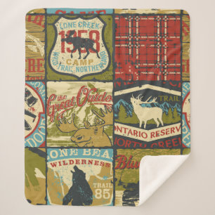 North territories adventure sign and symbol patchw sherpa blanket