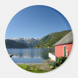 Norwegian fjord view and boathouse round magnet