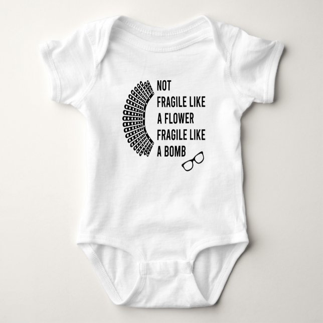 Not Fragile Like a Flower, Fragile Like a Bomb Baby Bodysuit (Front)