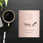 Notary loan signing agent rose gold 2024 planner<br><div class="desc">A chic rose gold,  blush background,  decorated with a feather pen.  Personalise and add your business logo and a name and year(s).  Black text: Notary</div>