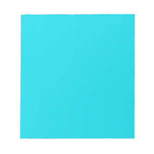 Notepad with Bright Neon Teal Blue Background