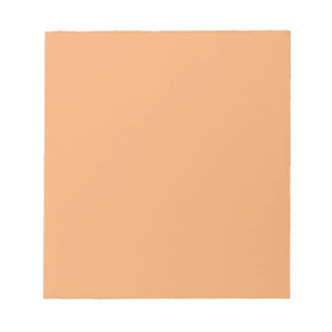 Notepad with Pastel Orange Background
