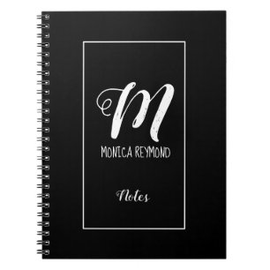 notes on black monogrammed notebook