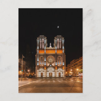 Notre-dame de nice in the night glowing postcard