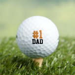 Number One Dad Orange and Black Father's Day Golf Balls<br><div class="desc">Create a special Father's Day gift for dad or grandpa personalised with your photos and text. This fun modern design says "#1 Dad" in bold text. Use the design tools to choose any fonts and colours you like or upload your own photos to design a completely one of a kind...</div>