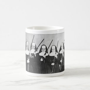 NUNS WITH GUNS COFFEE MUG. COFFEE MUG