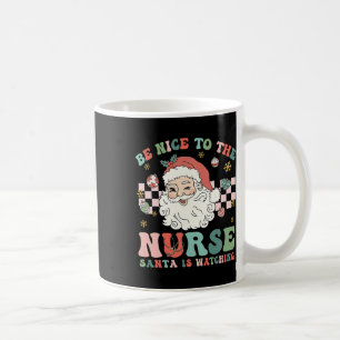 Nurse Christmas Be Nice To The Nurse Santa Is Watc Coffee Mug