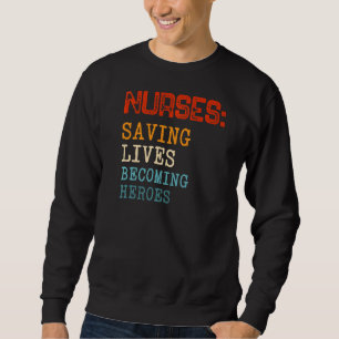 Nurses Saving Lives Becoming Heroes Medical Assist Sweatshirt